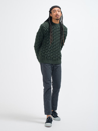 Dark Green Cable Sweater Outfits For Men: This pairing of a dark green cable sweater and charcoal chinos will hallmark your skills in menswear styling even on dress-down days. For a more casual vibe, why not complete this getup with a pair of black and white canvas low top sneakers?