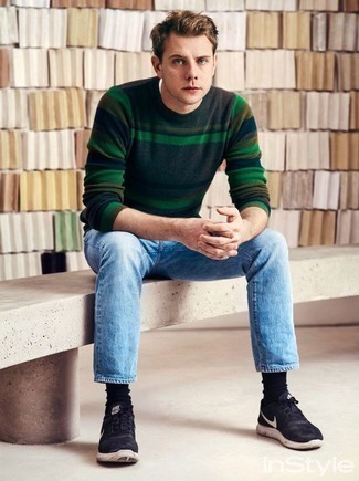 Dark Green Horizontal Striped Crew-neck Sweater Outfits For Men: A dark green horizontal striped crew-neck sweater and light blue jeans have become a must-have combination for many stylish men. You know how to dial it down: black and white athletic shoes.