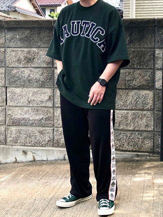 Black Sweatpants Outfits For Men: For a street style outfit, Pair a dark green print crew-neck t-shirt with black sweatpants. Balance out your outfit with a sleeker kind of shoes, such as these dark green canvas low top sneakers.
