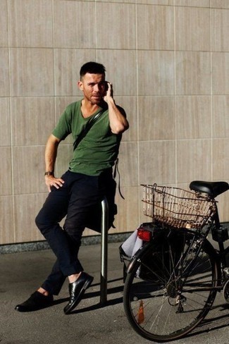Dark Green Crew-neck T-shirt Outfits For Men: This ensemble with a dark green crew-neck t-shirt and navy chinos isn't so hard to achieve and leaves room to more experimentation. Black leather derby shoes are the most effective way to bring a sense of refinement to your look.