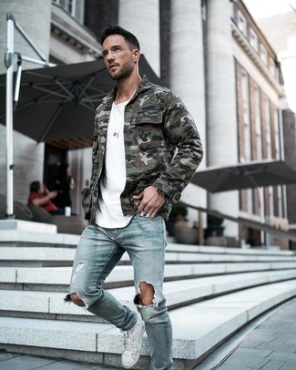 White and Red Leather High Top Sneakers Outfits For Men: This off-duty pairing of a dark green camouflage field jacket and light blue ripped skinny jeans is ideal when you need to look dapper in a flash. White and red leather high top sneakers are the glue that will bring your ensemble together.