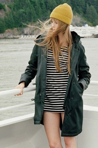 White and Black Horizontal Striped Shift Dress Outfits: Look incredibly stylish without exerting much effort by opting for a white and black horizontal striped shift dress and a dark green fishtail parka.