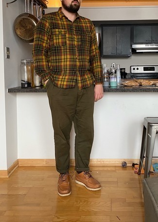 Brown Leather Derby Shoes Outfits: For a never-failing off-duty option, you can never go wrong with this combo of a dark green plaid long sleeve shirt and dark brown chinos. And if you need to instantly up the style ante of your ensemble with shoes, why not introduce brown leather derby shoes to this ensemble?