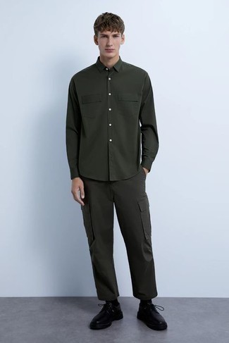 Dark Green Cargo Pants Outfits: This casual combo of a dark green long sleeve shirt and dark green cargo pants is a real life saver when you need to look dapper but have zero time to craft a look. Round off your ensemble with a pair of black leather derby shoes to change things up a bit.