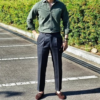 Dark Green Vertical Striped Long Sleeve Shirt Outfits For Men: A dark green vertical striped long sleeve shirt looks especially elegant when married with navy dress pants for a look worthy of a stylish gentleman. A pair of dark brown suede loafers immediately ramps up the fashion factor of this ensemble.