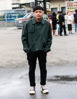 Dark Green Military Jacket Outfits For Men: Super stylish and practical, this combination of a dark green military jacket and black ripped jeans provides with wonderful styling possibilities. A pair of black and white canvas low top sneakers looks great here.
