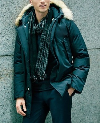 Dark Green Parka Outfits For Men: This pairing of a dark green parka and black chinos is hard proof that a pared down off-duty ensemble can still look really interesting.