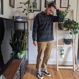 Dark Green Horizontal Striped Polo Neck Sweater Outfits For Men: Parade your classy self by wearing a dark green horizontal striped polo neck sweater and khaki chinos. Does this ensemble feel all-too-dressy? Let a pair of black and white canvas low top sneakers switch things up.