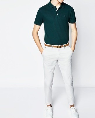 Dark Green Polo Outfits For Men: This off-duty pairing of a dark green polo and white chinos is a tested option when you need to look casually dapper in a flash. For extra style points, add a pair of white canvas low top sneakers to your ensemble.