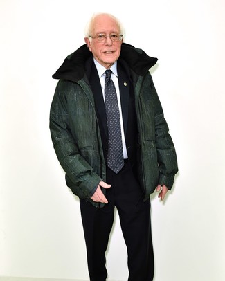 Bernie Sanders wearing Dark Green Puffer Jacket, Black Suit, White Dress Shirt, Black and White Print Tie