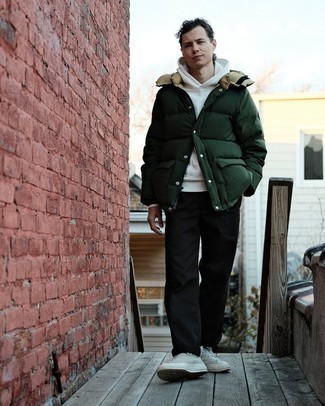 Black Chinos Cold Weather Outfits: This pairing of a dark green puffer jacket and black chinos is a mix between dressy and off-duty. Get a bit experimental on the shoe front and complete your look with grey canvas high top sneakers.