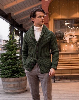 Dark Green Shawl Cardigan Outfits For Men: For an ensemble that's casually neat and gasp-worthy, marry a dark green shawl cardigan with brown chinos.