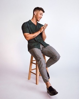 Dark Green Short Sleeve Shirt Outfits For Men: Go for a straightforward but at the same time casually cool option combining a dark green short sleeve shirt and grey plaid chinos. Serve a little mix-and-match magic by slipping into black leather loafers.