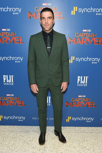 Dark Green Suit Outfits: For a look that's elegant and gasp-worthy, team a dark green suit with a black dress shirt. Add black leather chelsea boots to the mix to make a mostly classic look feel suddenly fun and fresh.