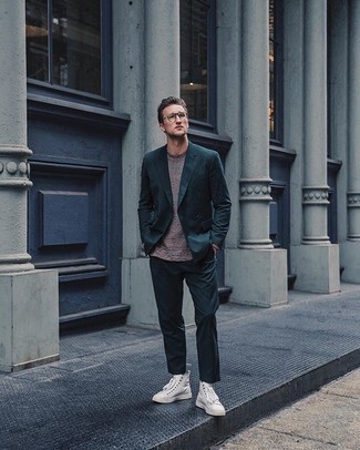 Dark Green Suit Outfits: Make no doubt, you'll look cool and smart in a dark green suit and a brown crew-neck sweater. White canvas high top sneakers are guaranteed to bring a hint of stylish casualness to your outfit.