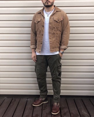 Tan Denim Jacket Outfits For Men: You'll be surprised at how very easy it is for any gentleman to put together this relaxed ensemble. Just a tan denim jacket paired with olive cargo pants. Make this look slightly more elegant by finishing off with dark brown leather casual boots.