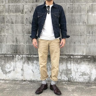 Navy Jacket Outfits For Men: For effortless style without the need to sacrifice on practicality, we love this pairing of a navy jacket and khaki chinos. Go ahead and complement your ensemble with a pair of burgundy leather derby shoes for a sense of refinement.