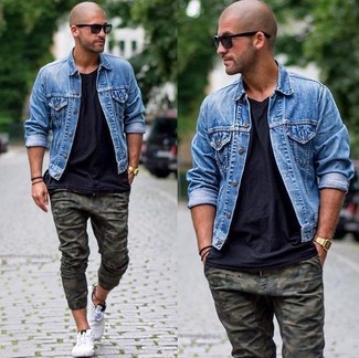 Olive Camouflage Chinos Outfits: A blue denim jacket looks especially cool when paired with olive camouflage chinos in a relaxed casual menswear style. All you need now is a pair of white plimsolls to finish off your outfit.