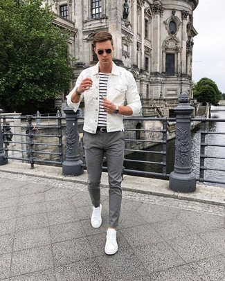 White Denim Jacket Outfits For Men: A white denim jacket and grey chinos are the kind of a foolproof off-duty look that you so awfully need when you have zero time. And if you wish to immediately tone down this ensemble with one single item, add white low top sneakers to your outfit.