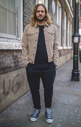 Blue Canvas High Top Sneakers Outfits For Men: Reach for a beige denim jacket and black chinos for a seriously stylish, casual look. Give a more casual twist to an otherwise all-too-safe look by rounding off with blue canvas high top sneakers.