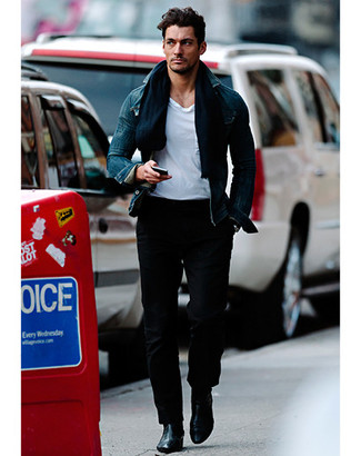 This laid-back pairing of a navy denim jacket and black chinos is very easy to put together without a second thought, helping you look on-trend and prepared for anything without spending a ton of time going through your wardrobe. And if you wish to instantly perk up your look with one piece, why not introduce a pair of black leather chelsea boots to your ensemble?