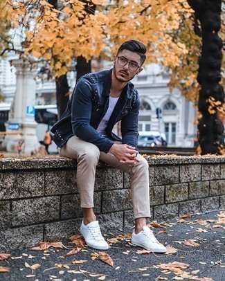 Denim Jacket with Low Top Sneakers Outfits For Men: Pair a denim jacket with beige chinos to prove you've got expert sartorial prowess. If you want to break out of the mold a little, complete this ensemble with a pair of low top sneakers.