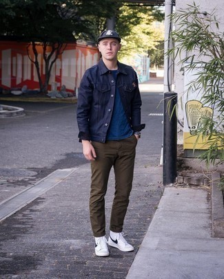 White and Black High Top Sneakers Outfits For Men: Fashionable and comfortable, this casual pairing of a navy denim jacket and dark brown chinos delivers variety. For footwear, you could stick to a more casual route with a pair of white and black high top sneakers.