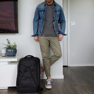 Charcoal Canvas Low Top Sneakers Outfits For Men: If you love classic pairings, then you'll like this combo of a blue denim jacket and olive chinos. For something more on the daring side to round off this outfit, make charcoal canvas low top sneakers your footwear choice.