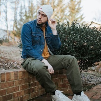 White Beanie Outfits For Men: This off-duty combo of a navy denim jacket and a white beanie is a real life saver when you need to look dapper in a flash. Complement your ensemble with white athletic shoes and you're all set looking amazing.