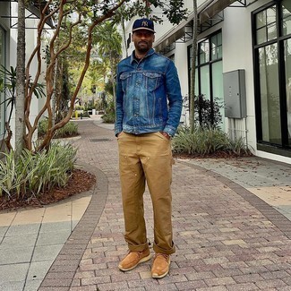 Navy Print Baseball Cap Outfits For Men: This off-duty combination of a blue denim jacket and a navy print baseball cap is a life saver when you need to look cool but have zero time. Introduce a pair of tan suede desert boots to the equation for an added dose of style.