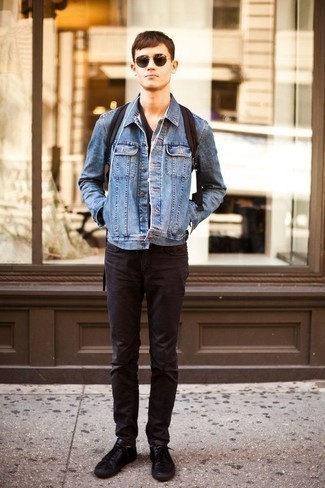 Black and White Leather Low Top Sneakers Outfits For Men: Effortlessly blurring the line between cool and casual, this combination of a light blue denim jacket and black jeans can easily become your favorite. Black and white leather low top sneakers integrate smoothly within plenty of combos.