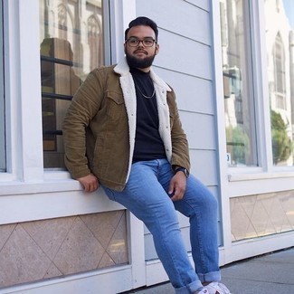 Olive Denim Jacket Outfits For Men: If you don't like putting too much effort into your ensembles, opt for an olive denim jacket and light blue jeans. A pair of red and white canvas low top sneakers integrates effortlessly within plenty of combos.
