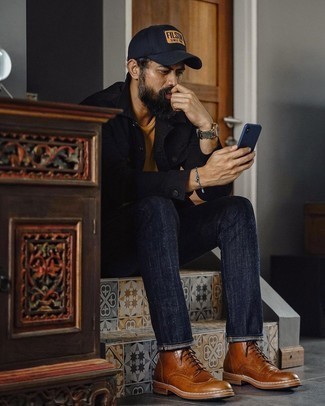Navy Print Baseball Cap Outfits For Men: If the situation permits a casual menswear style, team a black denim jacket with a navy print baseball cap. With shoes, you can follow the classic route with a pair of brown leather brogue boots.