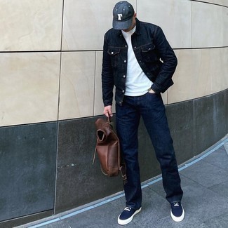 Dark Brown Leather Backpack Outfits For Men: Marry a navy denim jacket with a dark brown leather backpack to be both off-duty and dapper. To bring out a sophisticated side of you, introduce navy and white canvas low top sneakers to your ensemble.