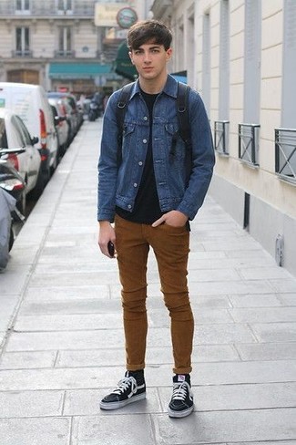 Dark Brown Jeans Outfits For Men: A blue denim jacket and dark brown jeans are a nice pairing worth integrating into your day-to-day repertoire. Go off the beaten track and break up your ensemble by slipping into a pair of black canvas high top sneakers.