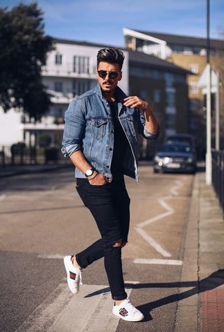 Black Ripped Skinny Jeans Outfits For Men: Make a blue denim jacket and black ripped skinny jeans your outfit choice to create an extra sharp and contemporary outfit. And if you need to effortlessly perk up your look with footwear, why not complement this ensemble with white leather low top sneakers?