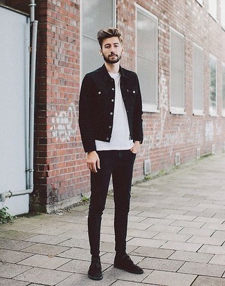 Black Suede Desert Boots Outfits: This combo of a black denim jacket and black skinny jeans is on the casual side yet it's also sharp and seriously sharp. For something more on the classy end to finish this outfit, complement your look with a pair of black suede desert boots.