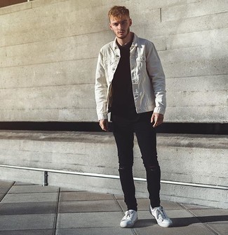 Tan Denim Jacket Outfits For Men: This combo of a tan denim jacket and black ripped skinny jeans will be solid proof of your prowess in menswear styling even on weekend days. Get a bit experimental when it comes to footwear and add white canvas low top sneakers to your ensemble.