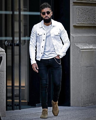 White and Black Denim Jacket Outfits For Men: A white and black denim jacket and navy skinny jeans are bona fide menswear must-haves if you're putting together an off-duty wardrobe that holds to the highest sartorial standards. Brown suede chelsea boots bring a classic aesthetic to the ensemble.