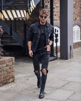 Black Ripped Jeans Outfits For Men: Who said you can't make a fashionable statement with a street style look? You can do so with ease in a black embroidered denim jacket and black ripped jeans. For something more on the classier side to complement this outfit, complete this getup with a pair of black leather brogue boots.
