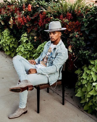 Light Blue Ripped Skinny Jeans Outfits For Men: Such staples as a light blue denim jacket and light blue ripped skinny jeans are an easy way to infuse understated dapperness into your day-to-day casual lineup. With shoes, you could stick to the classic route with a pair of grey suede chelsea boots.