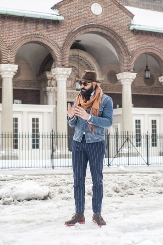 Tan Scarf Outfits For Men: Pair a blue denim jacket with a tan scarf for a relaxed twist on casual street menswear. Bring a more refined twist to this outfit by rounding off with dark brown suede desert boots.