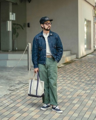 Henley Shirt Outfits For Men: A henley shirt and olive chinos? This is easily a wearable ensemble that you could sport on a day-to-day basis. Complete this look with a pair of navy and white canvas low top sneakers for maximum style.