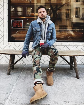 Uggs Outfits For Men: For an on-trend outfit without the need to sacrifice on comfort, we like this combination of a blue denim jacket and olive camouflage cargo pants. Feeling venturesome today? Switch things up by sporting a pair of uggs.