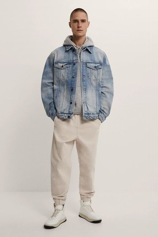 Beige Chinos Casual Outfits: Up your relaxed style a notch by wearing a light blue denim jacket and beige chinos. You could follow the casual route when it comes to shoes by finishing with a pair of white leather high top sneakers.