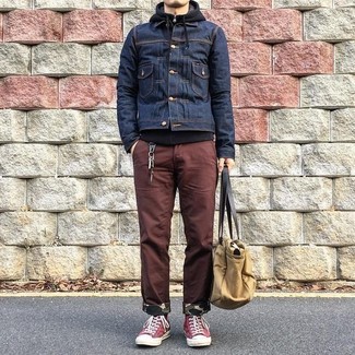 Tan Canvas Tote Bag Outfits For Men: Consider pairing a navy denim jacket with a tan canvas tote bag for a fashionable and urban ensemble. Channel your inner Ryan Gosling and complement your outfit with a pair of red canvas high top sneakers.