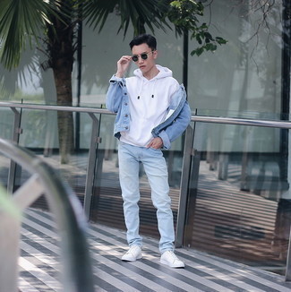 White Hoodie Outfits For Men: This combination of a white hoodie and light blue jeans is a great ensemble for off duty. Our favorite of an endless number of ways to complete this outfit is white canvas low top sneakers.