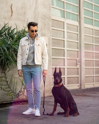Denim Jacket Outfits For Men: If you prefer laid-back style, why not take this combo of a denim jacket and light blue jeans for a spin? For maximum effect, add a pair of white canvas low top sneakers to the equation.