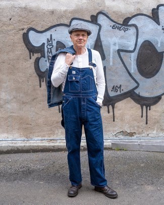 Overalls Outfits For Men: Go for a straightforward but at the same time casual and cool look putting together a navy denim jacket and overalls. And if you need to easily level up your ensemble with a pair of shoes, why not complement your outfit with dark brown leather casual boots?