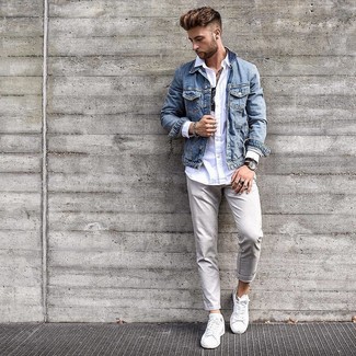 Light Blue Denim Jacket Outfits For Men: A light blue denim jacket and beige chinos are the kind of casual essentials that you can wear for years to come. A pair of white leather low top sneakers introduces just the right amount of casualness to this look.